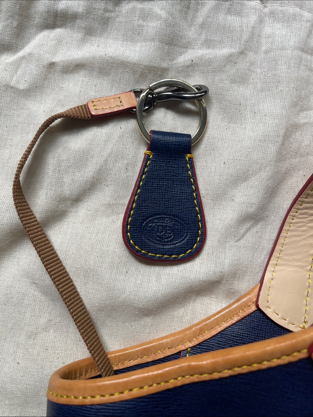 Dooney & Bourke Navy Leather Tote with Tan Trim and Tassel - Picture 3 of 12